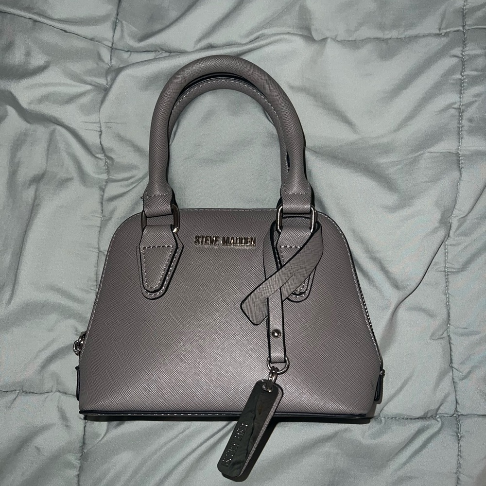 Steve Madden grey bag, comes with crossbody strap.